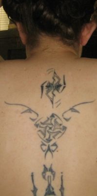 Upper back tatts
